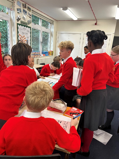 Year 6 children practising teamwork skills