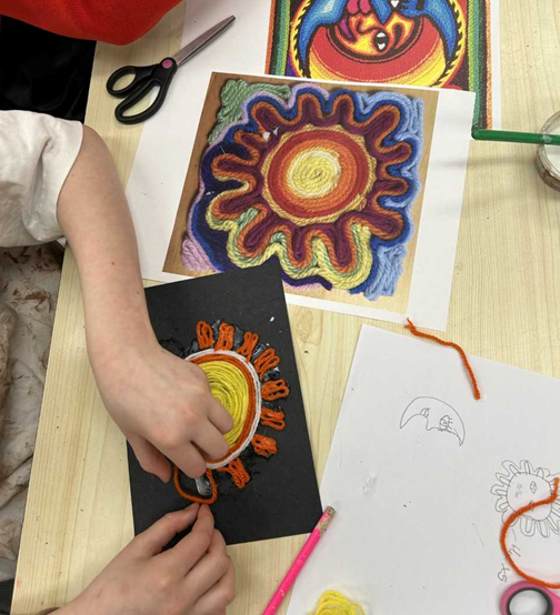 A child has made an image of the sun
