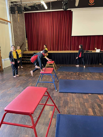 Year 6 using PE apparatus.