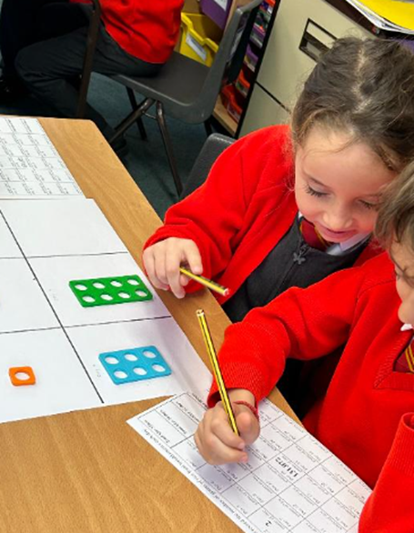 Year 2 using Numicon to support their maths learning