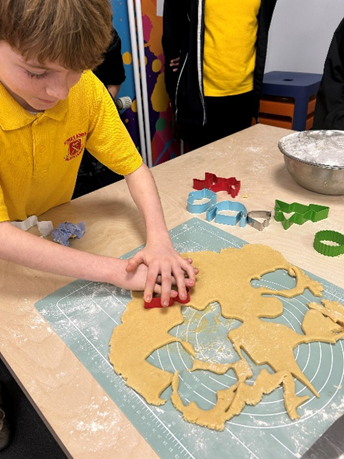 Year 6 children enjoying making their biscuits