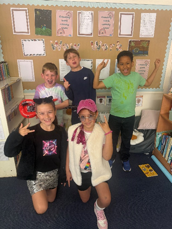 Children posing together dressed up as their TTRS Avatar. 
