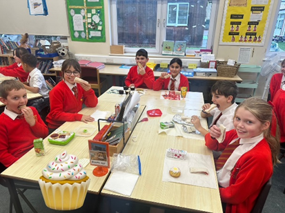 Children enjoying their afternoon tea cakes. 