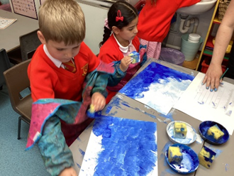 Creating backgrounds for our ocean art using sponges