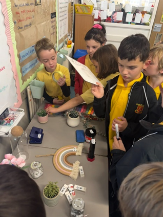 Children checking the prices of different items and making decisions on what to purchase.