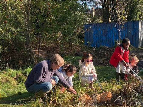 Photo of 1NP's visit to Woodcroft Wildspace - children pond dipping