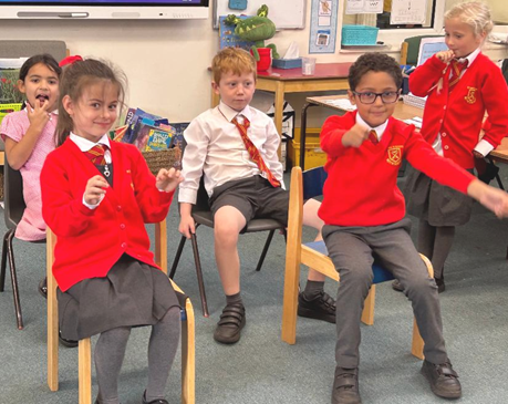 Black History Month - Y2 children re-enacting Rosa Parks' famous bus protest
