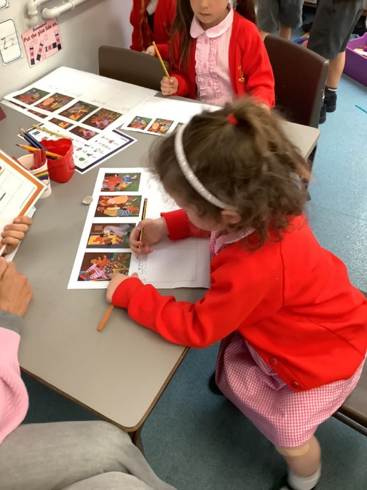 Reception using phonics to write.