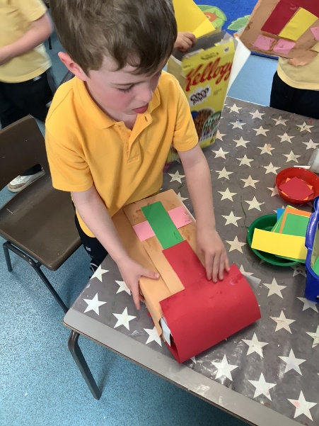 We then cut out shapes to add a door and windows.