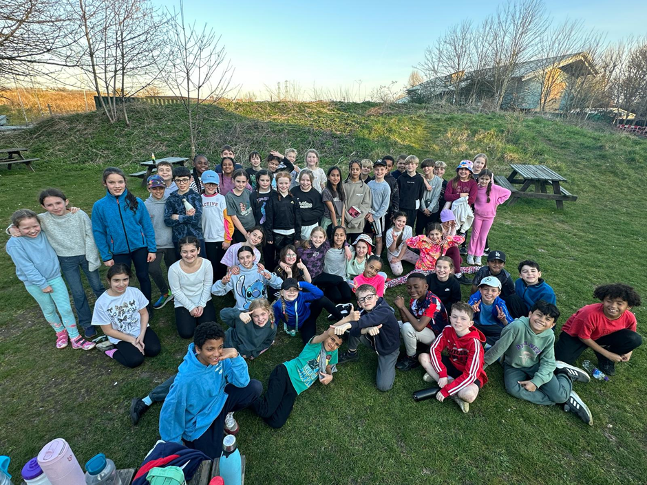 Photo of happy Year 5 children at the end of day 1