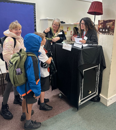 Children checking into The Savoy Hotel. 