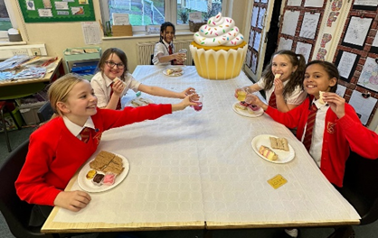 Children enjoying their afternoon tea