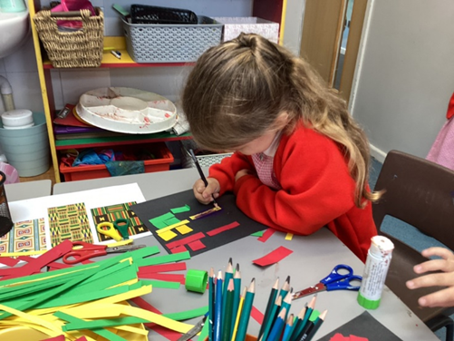 Making kente cloth from coloured card
