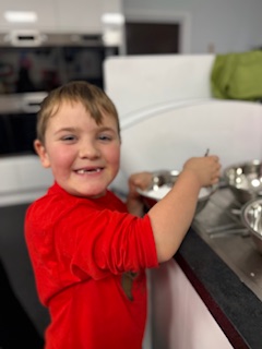 Year 2 enjoying decorating biscuits