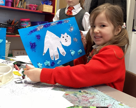 Proud of her polar bear artwork