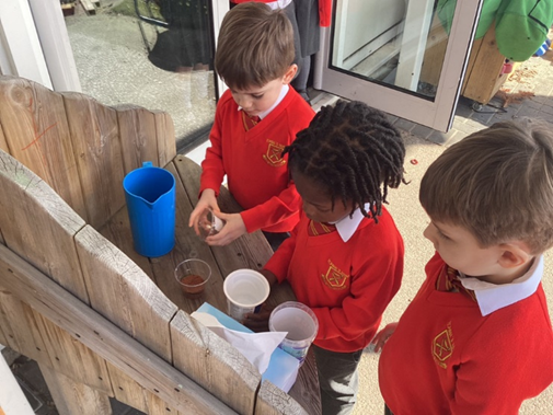 Adding cress and carefully watering it 