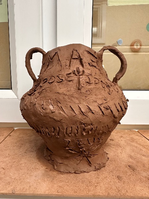 Year 5 making Greek Pots using clay.