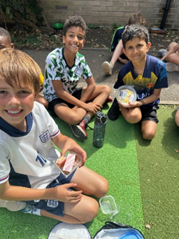 Children smiling and eating