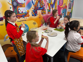 Children enjoying their quesadillas.