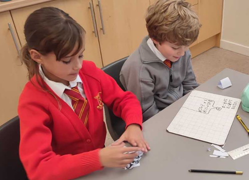 Year 4 children working during Maths Storybook Week