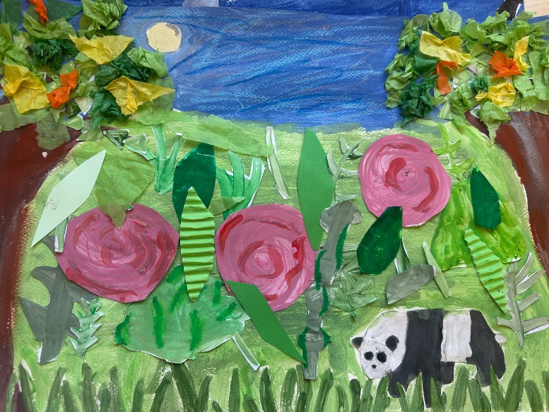 A panda amongst the leaves and plants.