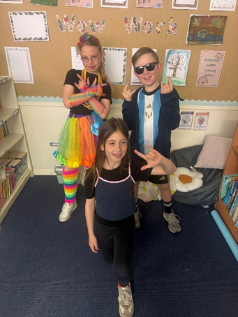 Children posing together dressed up as their TTRS Avatar. 