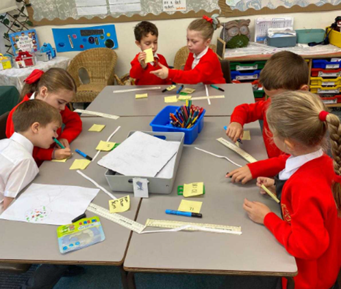 Year 1 children working during Maths Storybook Week