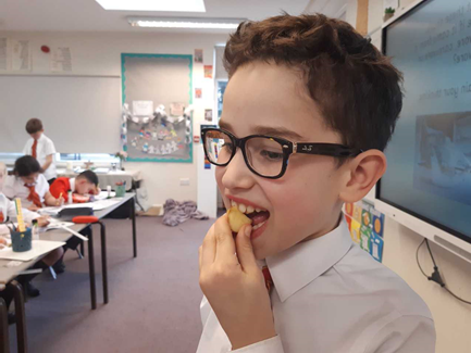 Year 4 chewing food, trying not to use front incisors.