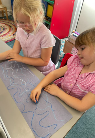 Sharing ideas to create water artwork.