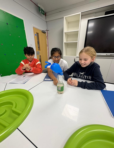 Year 6 carrying out an experiment