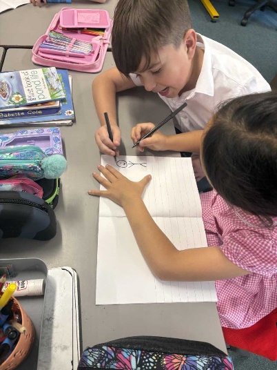 Children working on their flip book animations