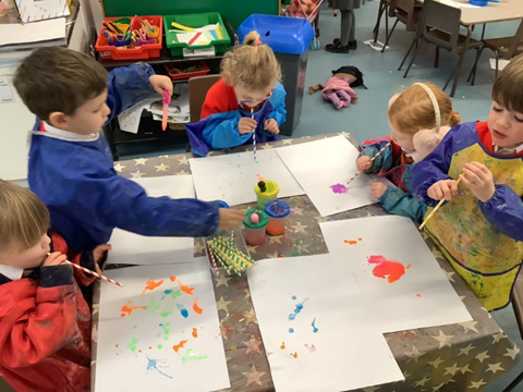 Blowing powder paint with straws