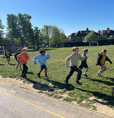 Year 6 running a mini marathon in school
