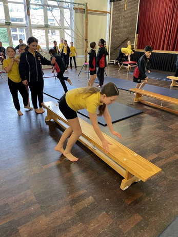 Year 6 using PE apparatus.