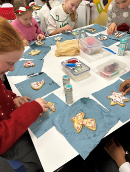Year 6 icing their biscuits