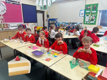 Children enjoying their afternoon tea sandwiches.