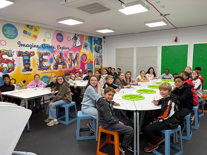 Year 6 enjoying experimenting in the STEAM room.