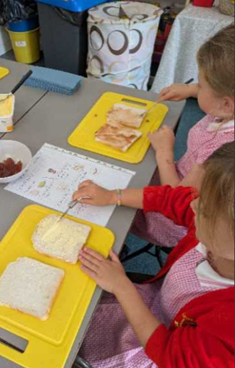 Year 1 children making sandwiches