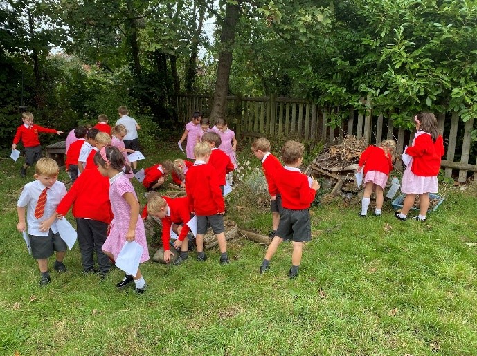 Year 2 exploring their local habitat picture 4